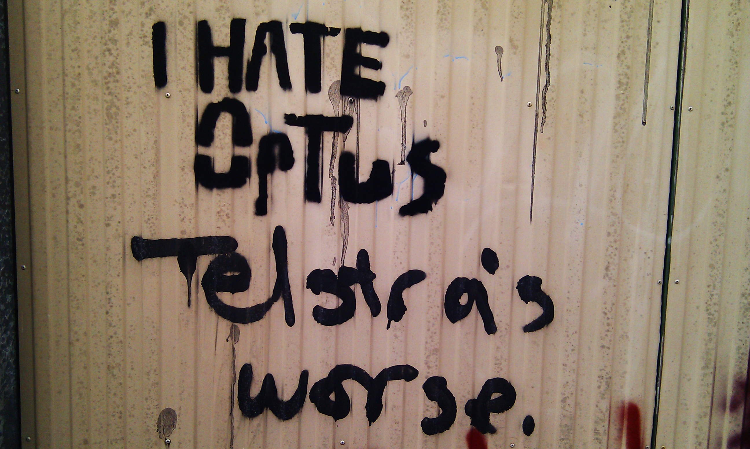 Anti Optus & Telstra graffiti in Newtown Sydney