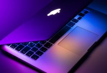 Is the Mac Pro Still Relevant in the Age of the M-series Macs? slightly opened silver MacBook