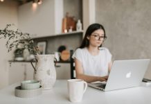 How to Choose a Laptop for College Focused young businesswoman working remotely at home