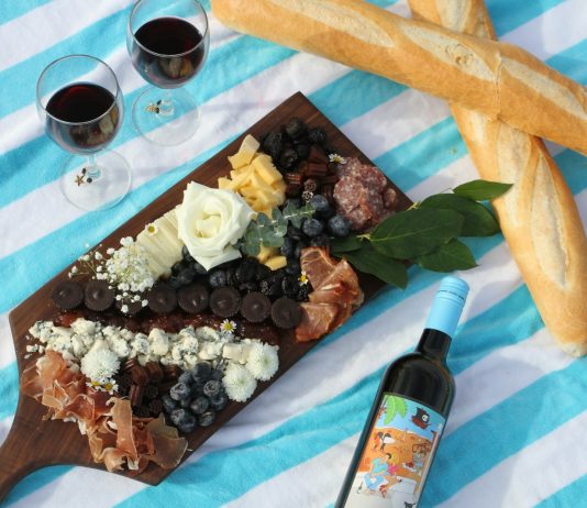 wine bottle beside ice cream on table