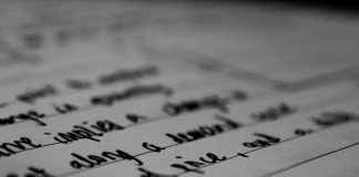 a close up of writing on a piece of paper
