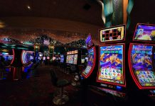 a casino room filled with lots of slot machines