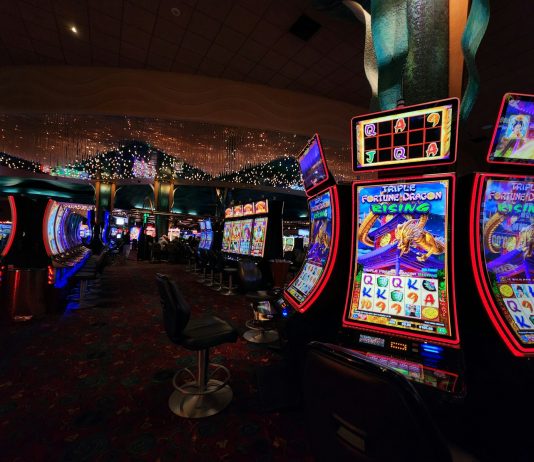 a casino room filled with lots of slot machines