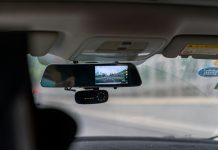 car side mirror with water droplets