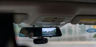 car side mirror with water droplets