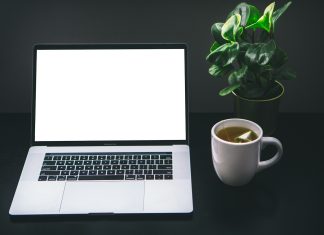 Real Estate Online: A Smart Move for Aspiring Realtors laptop turned on